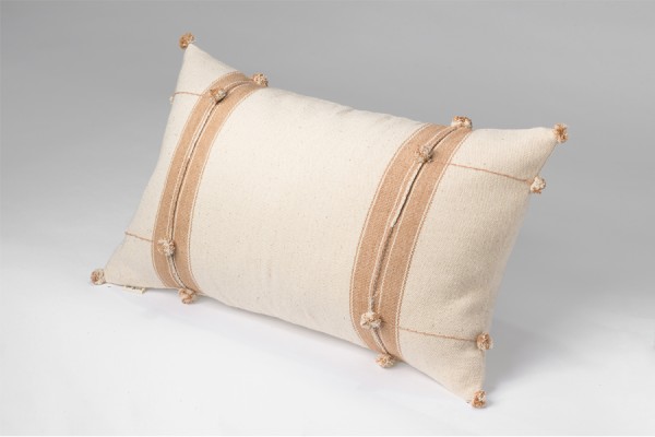 Cushion covers with pompoms